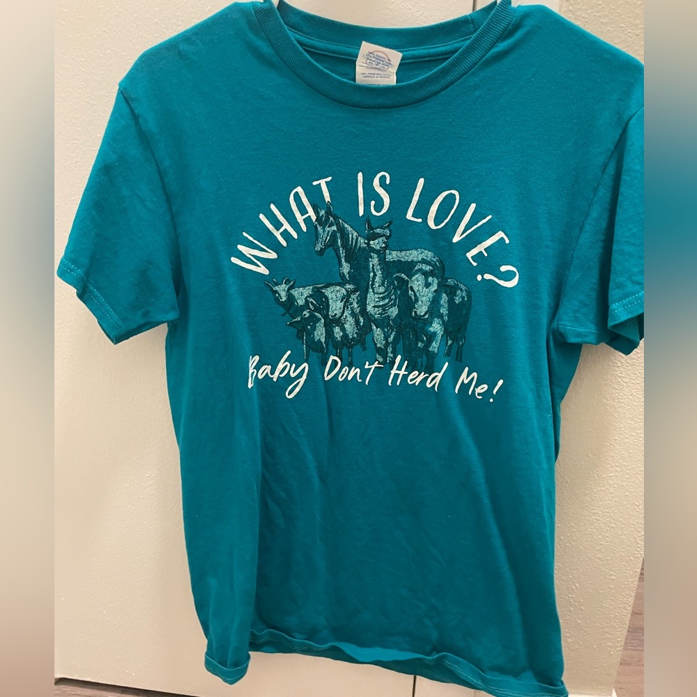 What is love? Baby don’t herd me 🐮- Teal Graphic Tee💙